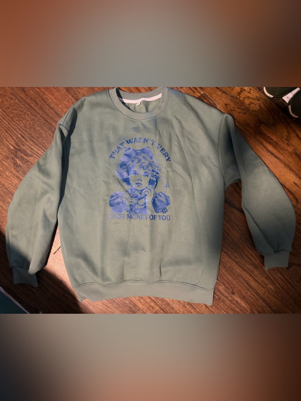 Not Very Cash Money of You Graphic Crewneck Sweatshirt in Sage Green